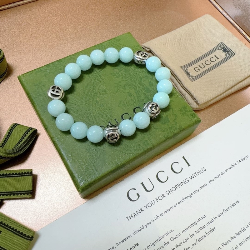 G*u*i bracelets
